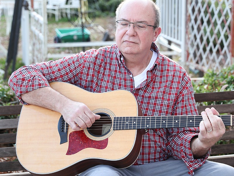 Guitarist Earl Waller enjoys sharing his passion for music